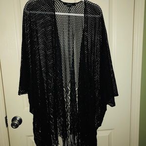 Elegant open weave fringed wrap